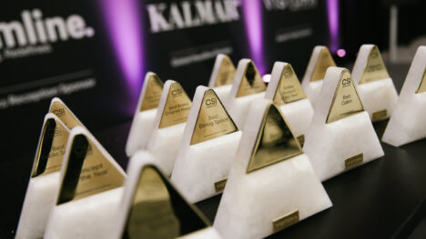 Cruise ship interiors awards displayed on a table